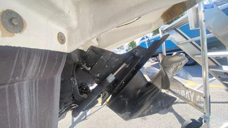 Slide: The Image of Close-up of a 2011 Sea Ray 300 Sundeck boat's propeller and stern drive. - 25