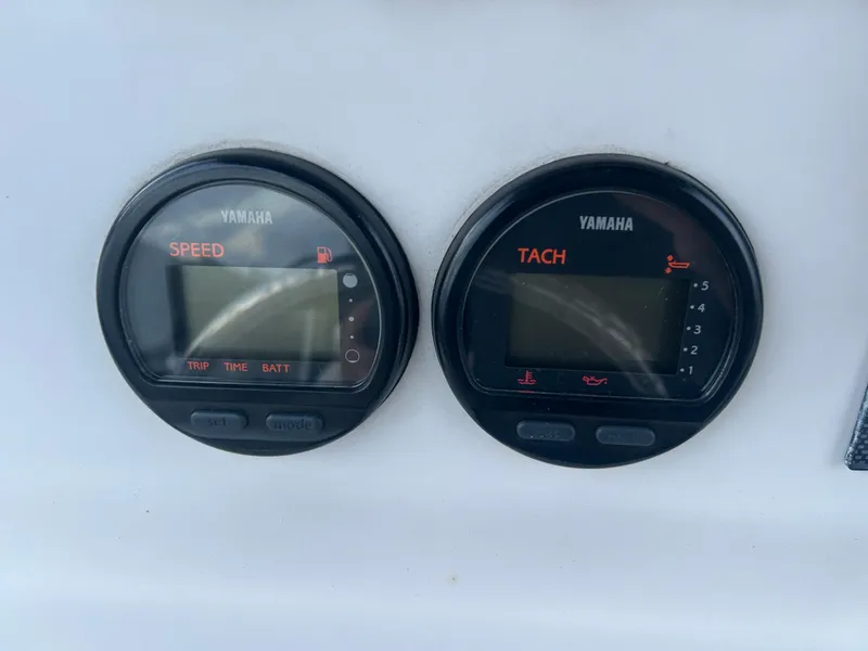 Slide: The Image of Yamaha speed and tachometer gauges on 2009 Cobia 216 Center Console boat. - 8
