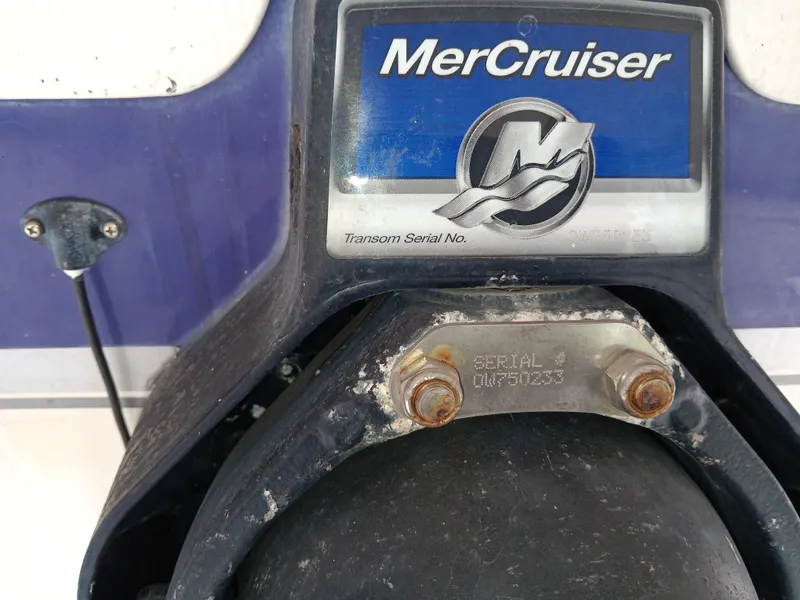Slide: The Image of MerCruiser logo on a 2008 Splendor 240 Sunstar boat. - 14