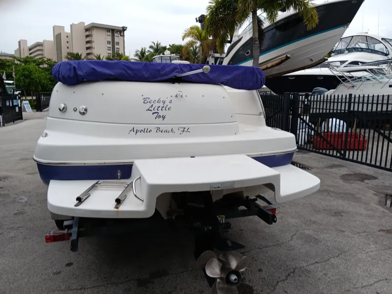 Slide: The Image of Rear view of a 2008 Splendor 240 Sunstar boat at the marina. - 2