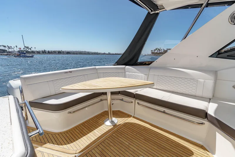 Slide: The Image of Luxurious seating area on 2021 Sea Ray Sundancer 320 Outboard yacht with scenic ocean view. - 28