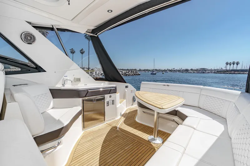 Slide: The Image of Luxurious interior of 2021 Sea Ray Sundancer 320 Outboard yacht with scenic ocean view. - 29