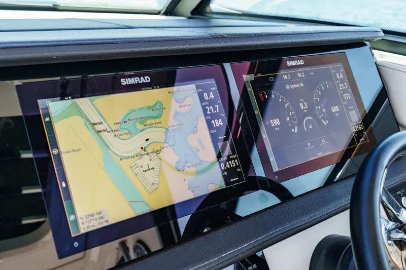 Slide: The Image of Simrad navigation display on 2021 Sea Ray Sundancer 320 Outboard boat dashboard. - 39