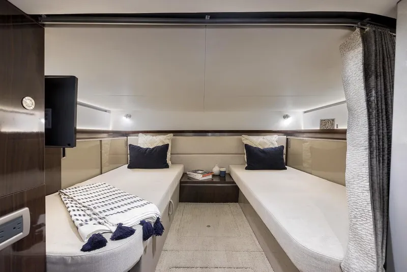 Slide: The Image of Manufacturer Provided Image: Interior cabin of 2021 Sea Ray Sundancer 320 OB with twin beds and modern decor. - 50