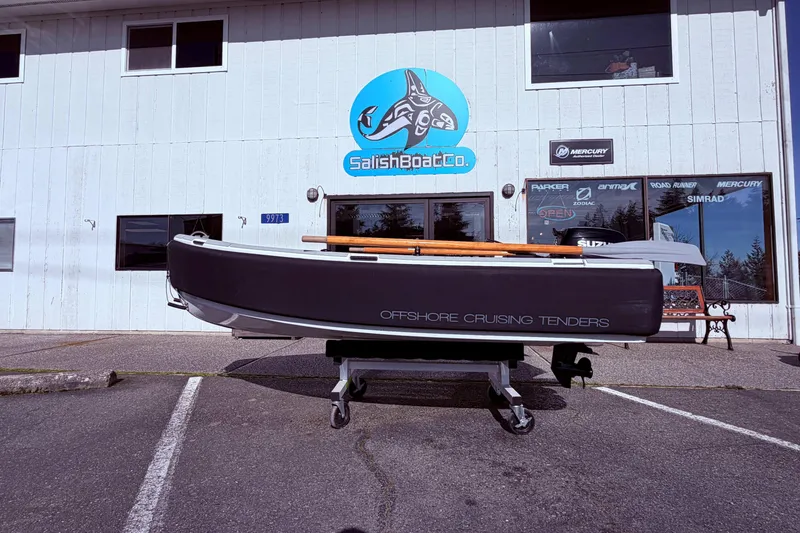 Slide: The Image of 2020 OC Tenders OC-300 boat displayed outside Salish Boat Co. building. - 15