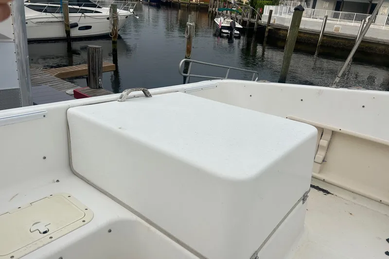 Slide: The Image of 2001 Sea Fox 204 Millenium boat interior, docked near waterfront. - 11