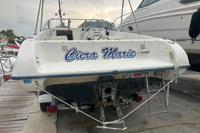 Slide: The Image of 2001 Sea Fox 204 Millenium boat named "Ciera Marie" docked at a marina. - 12
