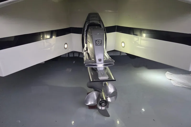 Slide: The Image of Stern view of 2010 Westport 23 Bow Rider Tender with visible propeller and hull details. - 21