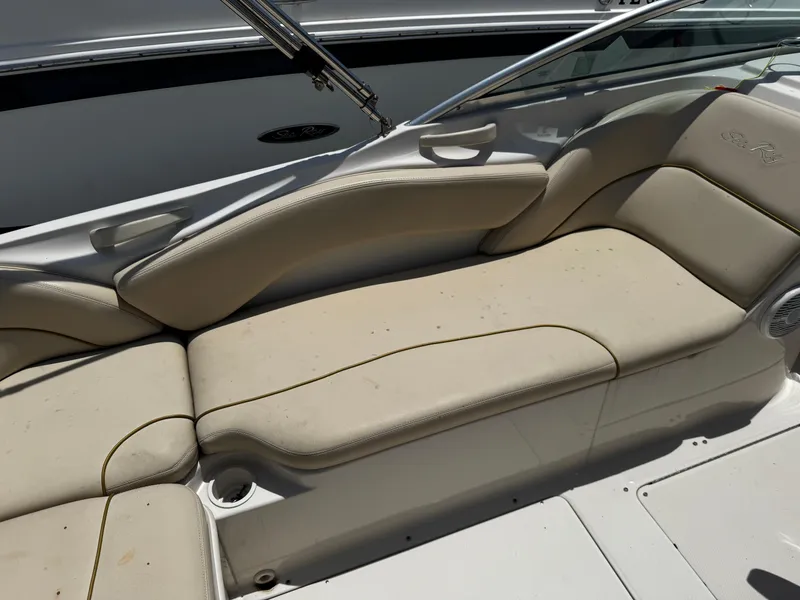 Slide: The Image of Beige seating on 2001 Sea Ray 240 Sundeck boat, featuring comfortable cushions and sleek design. - 5