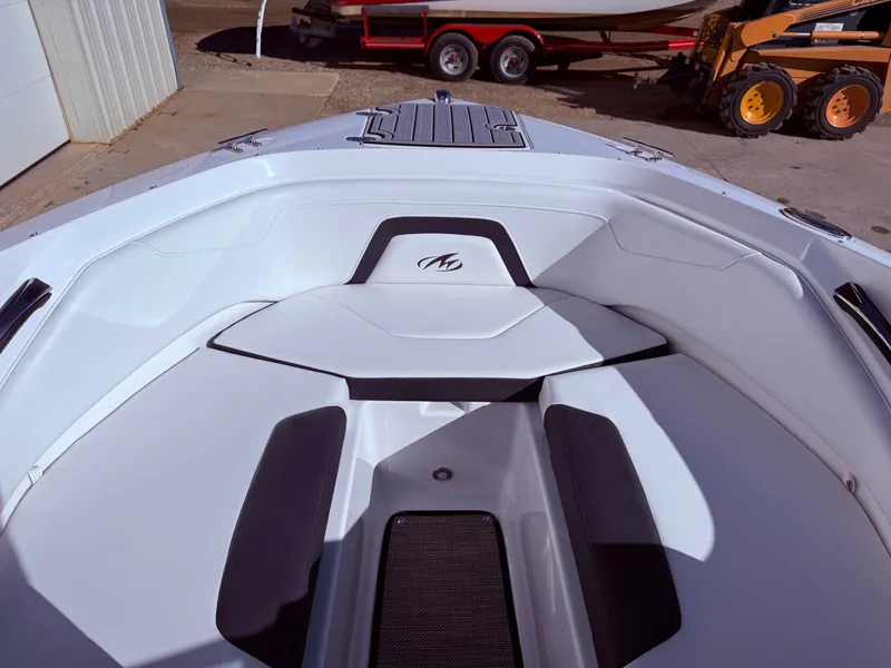 Slide: The Image of Interior view of 2023 Monterey 224FS boat with white seating area. - 10