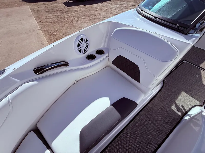 Slide: The Image of Interior of 2023 Monterey 224FS boat with white seating. - 12
