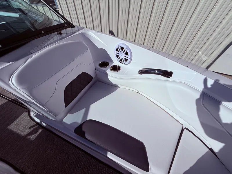 Slide: The Image of Interior of 2023 Monterey 224FS boat with speaker and cup holders. - 13