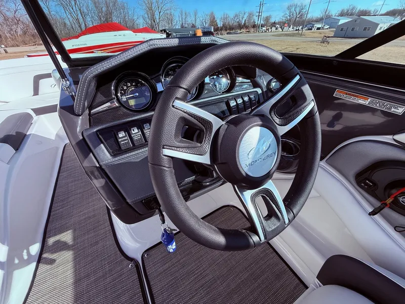 Slide: The Image of Steering wheel of 2023 Monterey 224FS boat, close-up. - 15