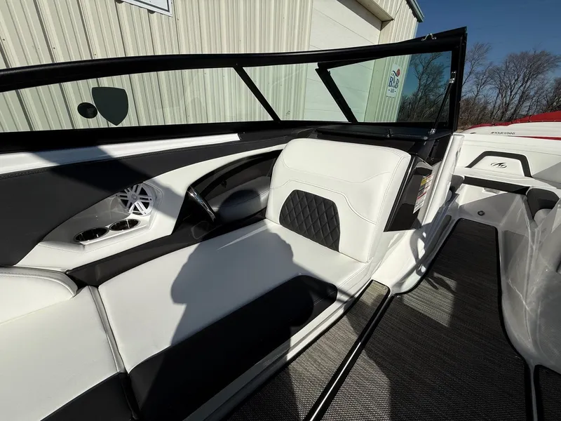 Slide: The Image of Interior of 2023 Monterey 224FS boat with white seating. - 19