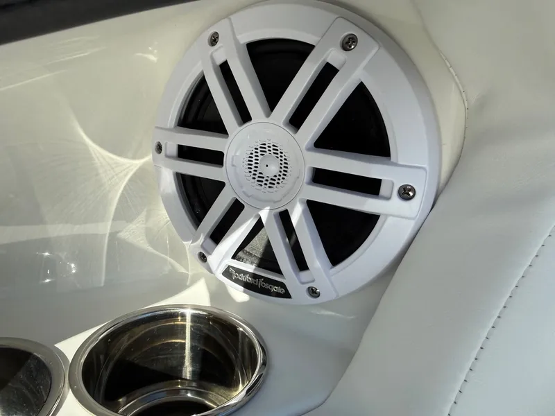 Slide: The Image of Speaker and cup holder in 2023 Monterey 224FS boat. - 25
