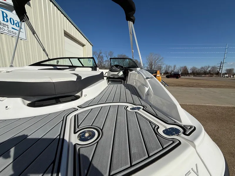 Slide: The Image of 2023 Monterey 224FS boat with sleek deck design. - 8