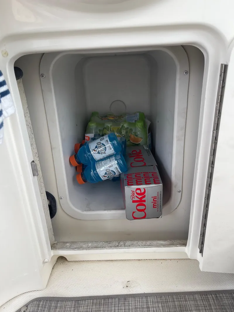 Slide: The Image of Beverage cooler on 2007 Sea Ray 380 Sundancer with drinks. - 14