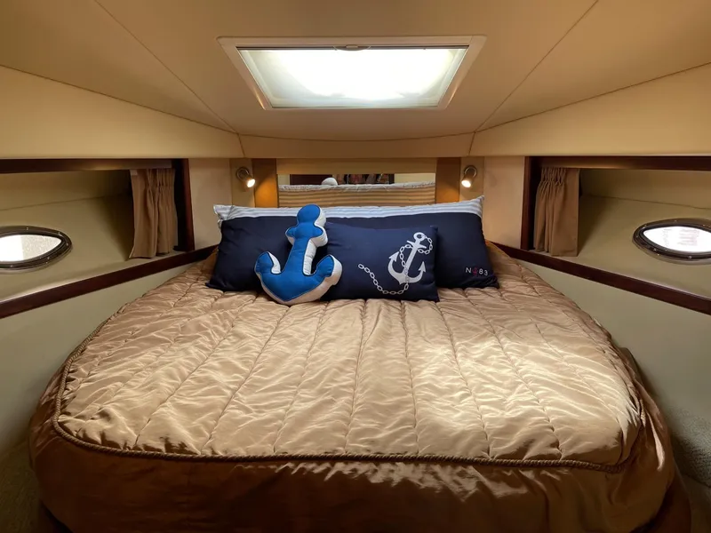 Slide: The Image of Luxurious bedroom in a 2007 Sea Ray 380 Sundancer yacht. - 25