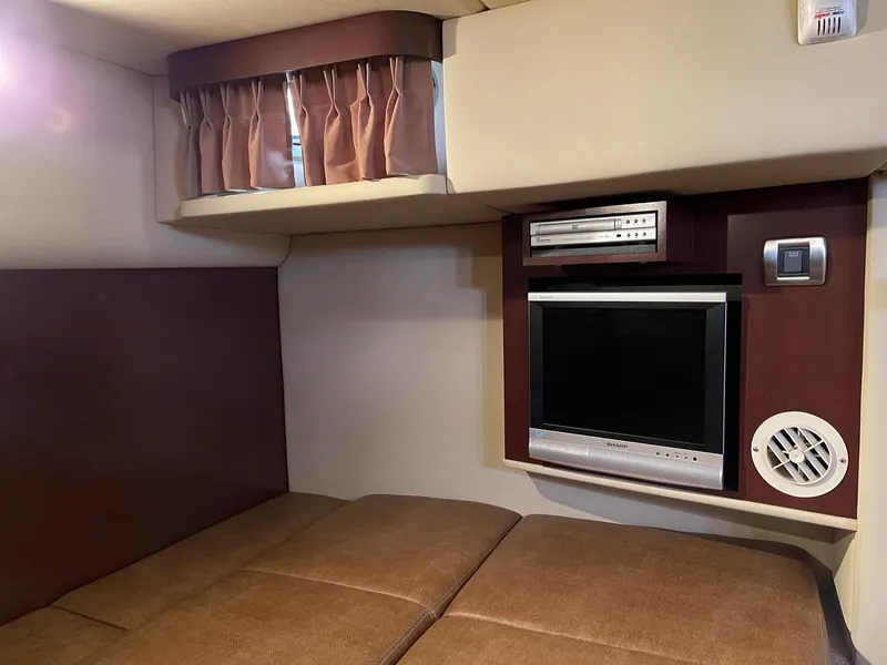 Slide: The Image of Interior of 2007 Sea Ray 380 Sundancer with TV and DVD player. - 33