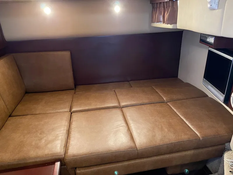 Slide: The Image of Interior of 2007 Sea Ray 380 Sundancer with leather sofa. - 37