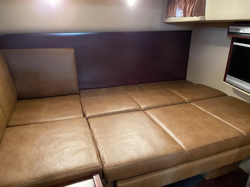 Slide: The Image of Interior of 2007 Sea Ray 380 Sundancer with brown sofa. - 39