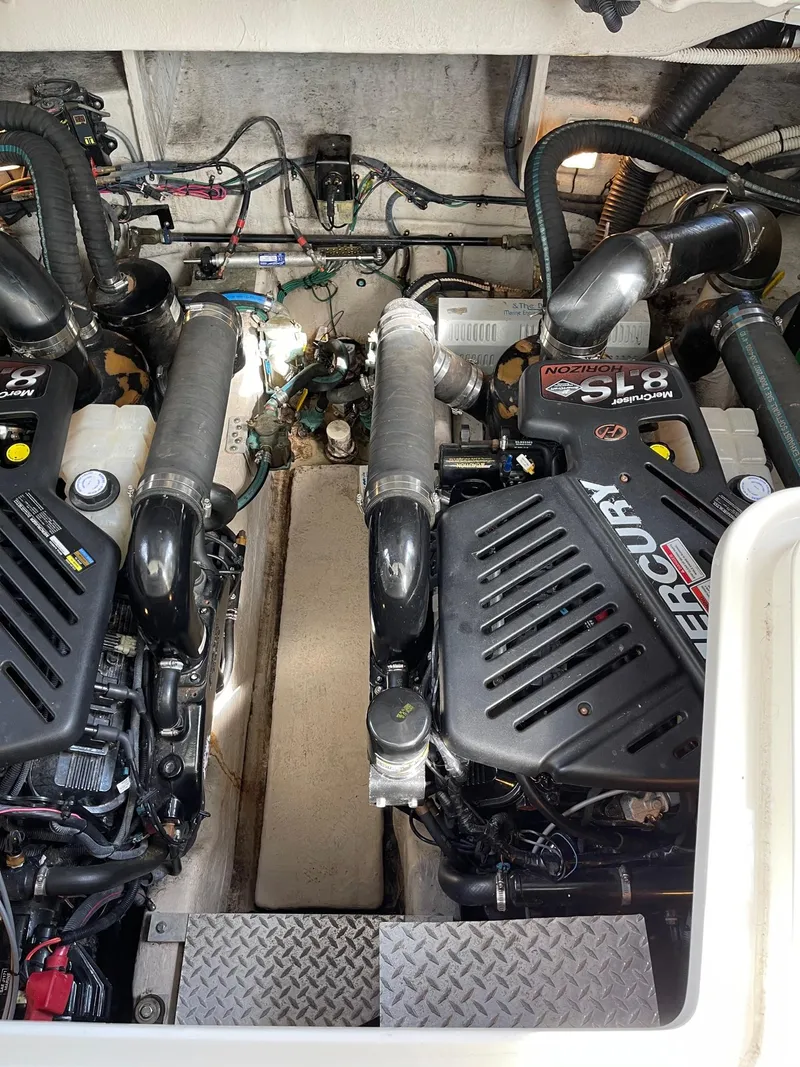 Slide: The Image of Engine room of a 2007 Sea Ray 380 Sundancer boat. - 43