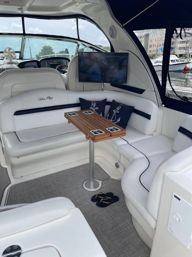 Slide: The Image of Interior of a 2007 Sea Ray 380 Sundancer yacht with elegant seating area. - 5