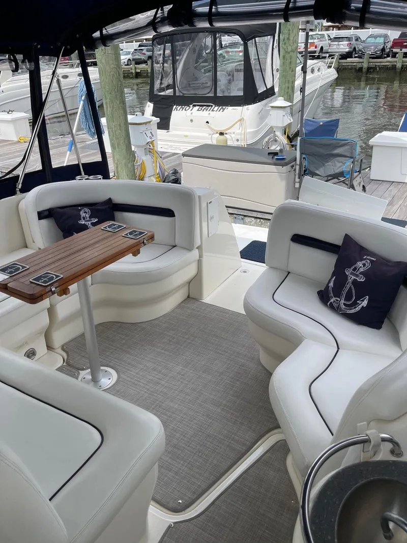 Slide: The Image of Interior of a 2007 Sea Ray 380 Sundancer with elegant seating arrangement. - 8