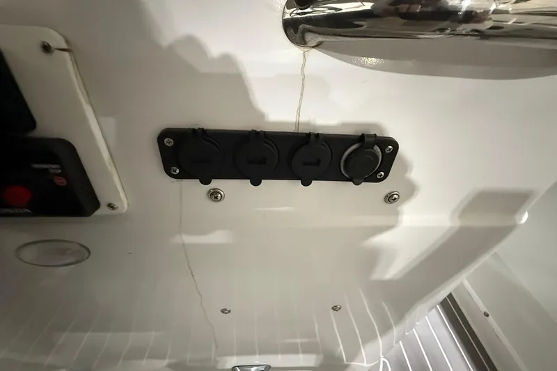 Slide: The Image of Control panel on a 1988 Stamas 255 Tarpon boat interior. - 24