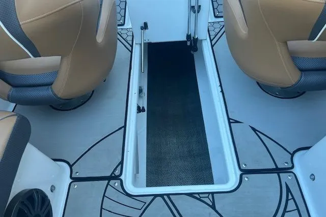 Slide: The Image of Interior view of 2021 Scarab 215 ID boat, featuring stylish seating and flooring design. - 43