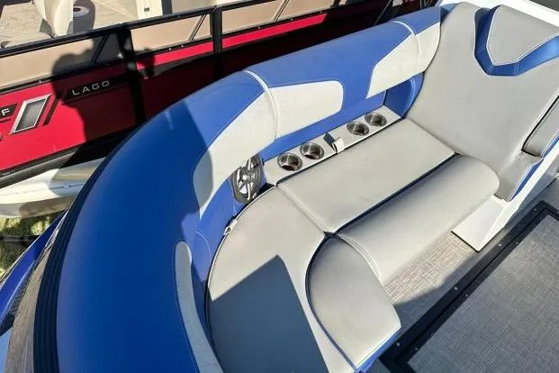 Slide: The Image of 2023 Montara 23 Surf Boss 2.0 CW boat interior with blue and gray seating. - 11