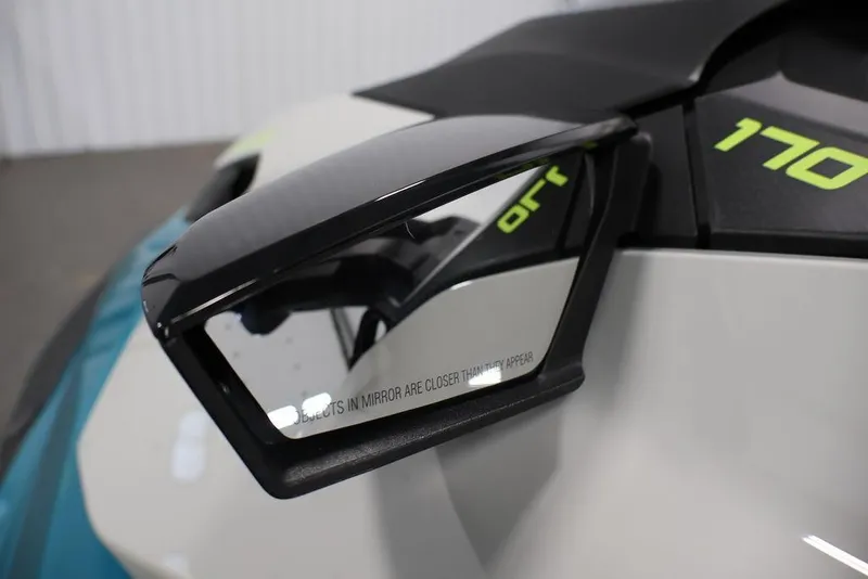 Slide: The Image of 2025 Sea-Doo GTI SE 170 side mirror with sleek design and vibrant "170" decal. - 10