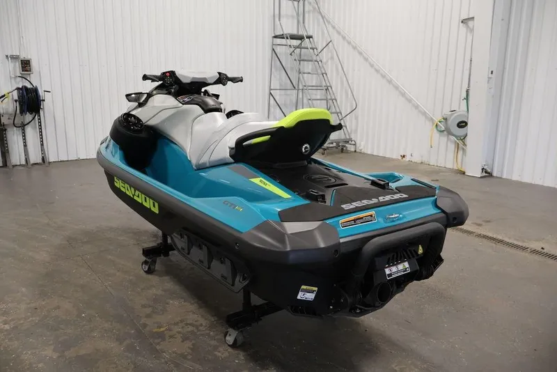 Slide: The Image of 2025 Sea-Doo GTI SE 170 jet ski in a garage setting. - 6