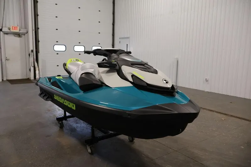 Slide: The Image of 2025 Sea-Doo GTI SE 170 jet ski in a garage setting. - 5