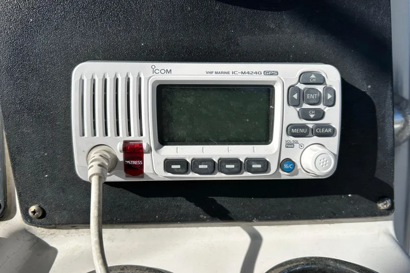 Slide: The Image of Icom VHF Marine IC-M424G GPS radio on 2002 Boston Whaler 260 Outrage boat. - 5