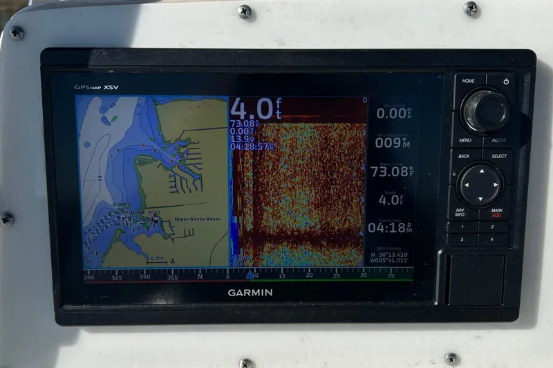 Slide: The Image of Garmin GPS display on 2002 Boston Whaler 260 Outrage, showing navigation and sonar data. - 7