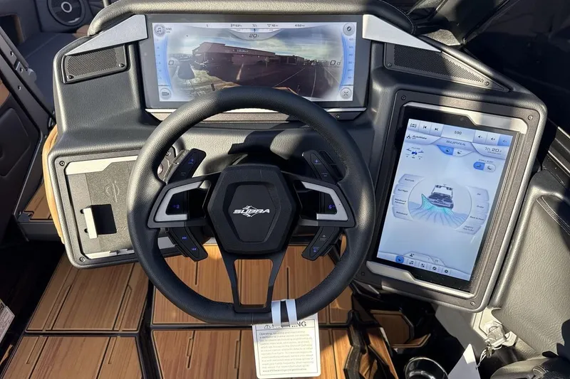 Slide: The Image of 2026 Supra SE 550 dashboard with advanced touchscreen controls and steering wheel. - 15