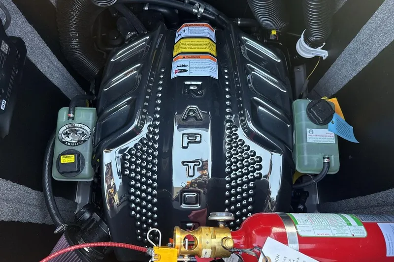 Slide: The Image of Engine compartment of a 2026 Supra SE 550 with Raptor branding and fire extinguisher. - 20