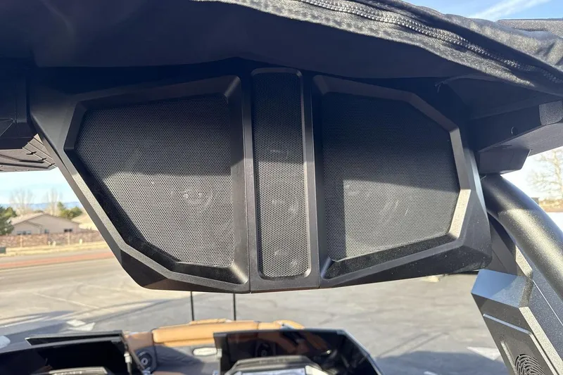 Slide: The Image of 2026 Supra SE 550 boat speakers under canopy, outdoor setting. - 21