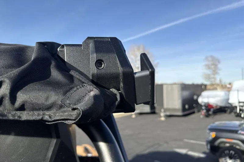 Slide: The Image of Close-up of a 2026 Supra SE 550 boat component under a clear blue sky. - 25