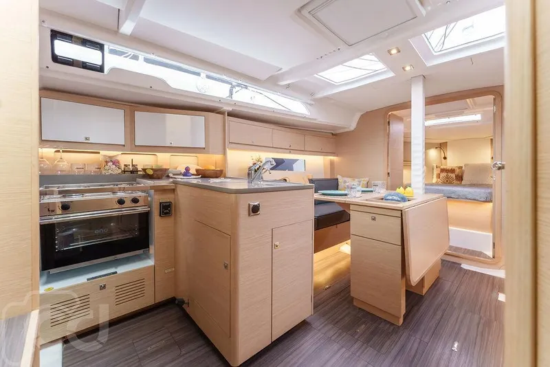 Slide: The Image of Aerial view of 2023 Dufour 37 sailboat on calm water. - 21