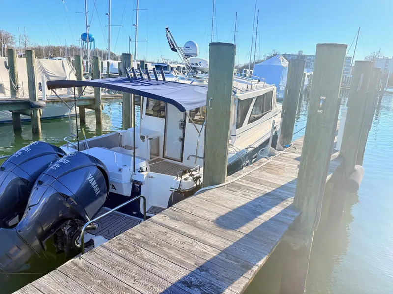 Slide: The Image of 2023 Cutwater 32 Coupe docked with Yamaha engines. - 5