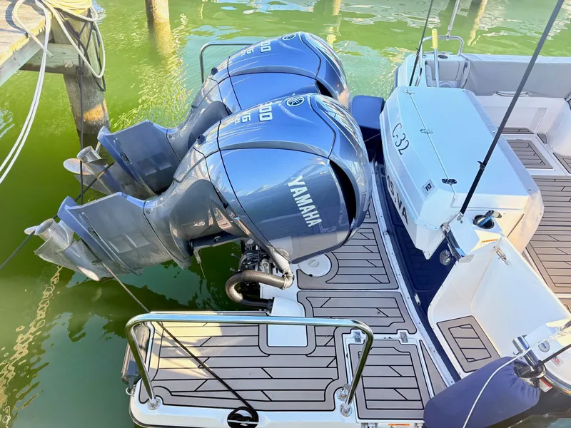 Slide: The Image of 2023 Cutwater 32 Coupe with Yamaha outboard engines at dock. - 6