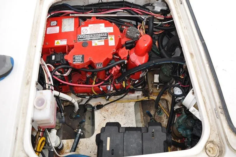 Slide: The Image of Engine compartment of a 2006 Pursuit 345 Drummond Sportfish with Westerbeke generator. - 6