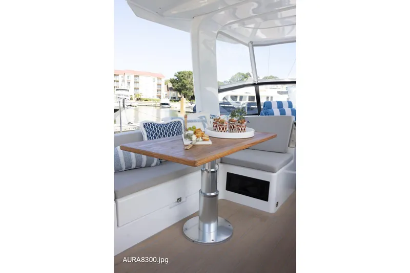 Slide: The Image of Luxurious 2023 Hanse 460 yacht interior with elegant dining area and stylish decor. - 3