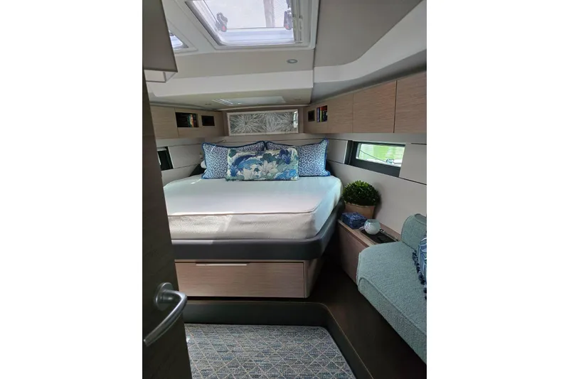 Slide: The Image of Luxurious cabin interior of 2023 Hanse 460 yacht with modern decor and skylight. - 6