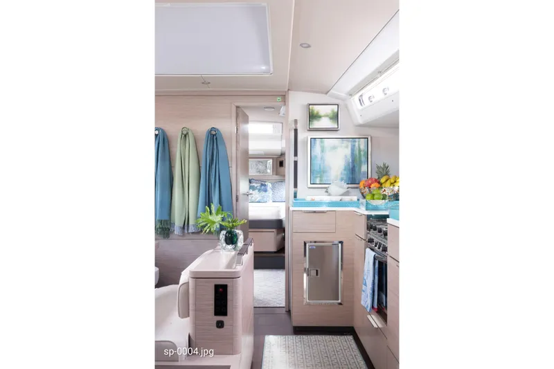 Slide: The Image of Modern interior of 2023 Hanse 460 yacht with stylish kitchen and cozy decor. - 9