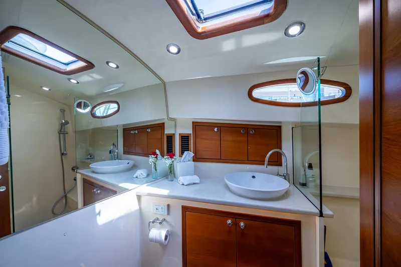 Slide: The Image of Luxurious bathroom interior of 2017 Grand Banks 44 Eastbay SX yacht with modern fixtures. - 44