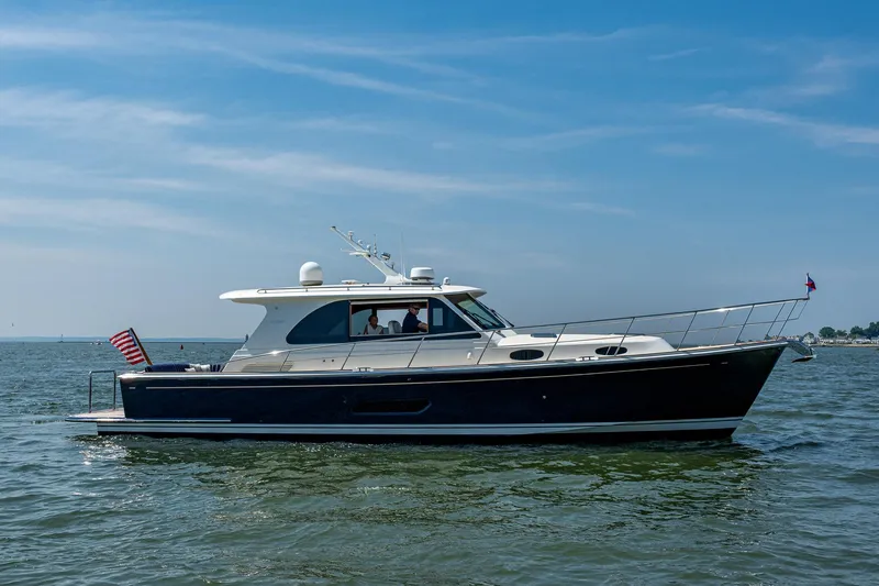 Slide: The Image of 2017 Grand Banks 44 Eastbay SX yacht on calm waters. - 5