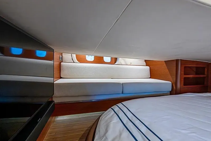 Slide: The Image of Luxurious interior of 2014 Zeelander Z44 yacht with cozy seating and elegant wood finish. - 12